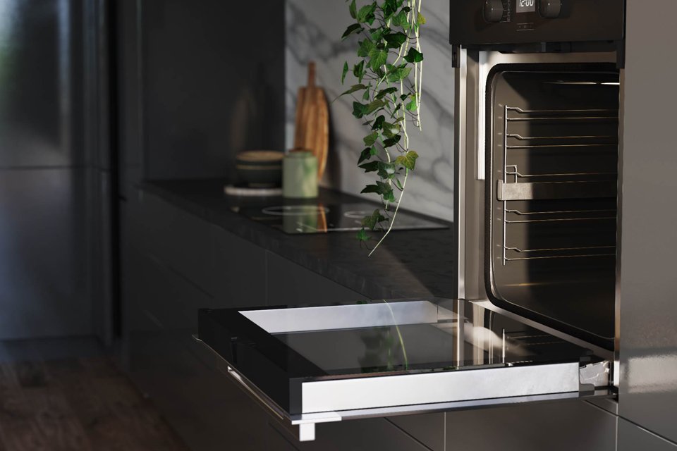 Side view of an open Miele built in oven.